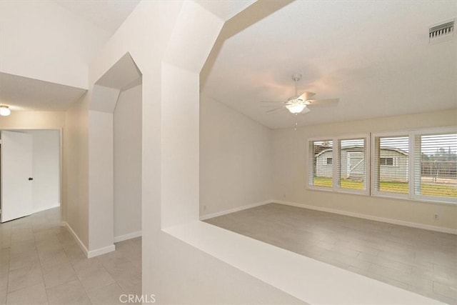 unfurnished room featuring ceiling fan