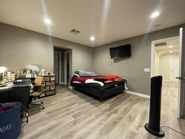 bedroom featuring light hardwood / wood-style floors