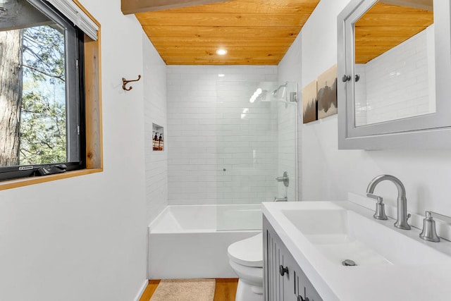 full bathroom featuring vanity, wood ceiling, toilet, and a healthy amount of sunlight