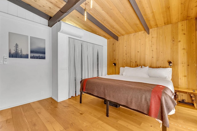 bedroom with wood ceiling, a wall mounted AC, light hardwood / wood-style floors, beamed ceiling, and wood walls