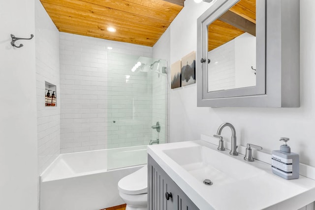 full bathroom featuring vanity, tiled shower / bath, wood ceiling, and toilet