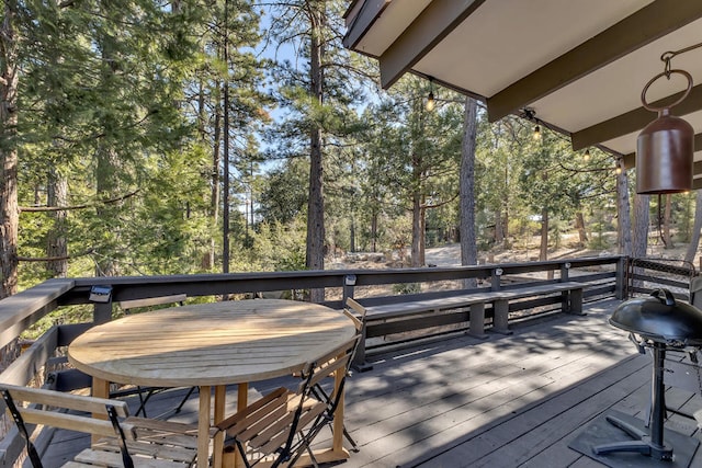 wooden terrace with area for grilling