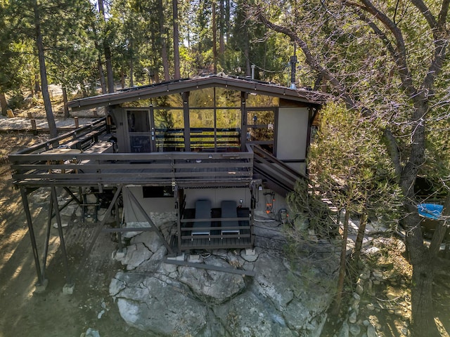 exterior space featuring a wooden deck