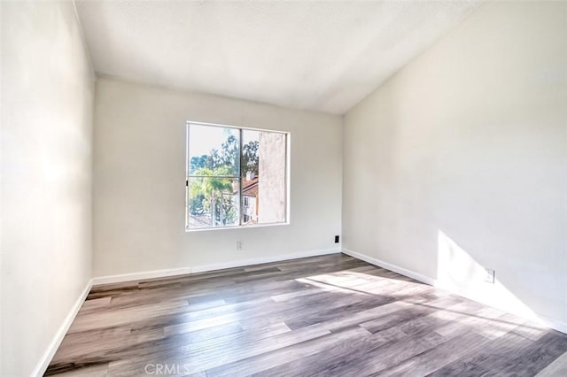 25246 San Michele, Laguna Niguel, CA 92677 - unfurnished room featuring baseboards and wood finished floors