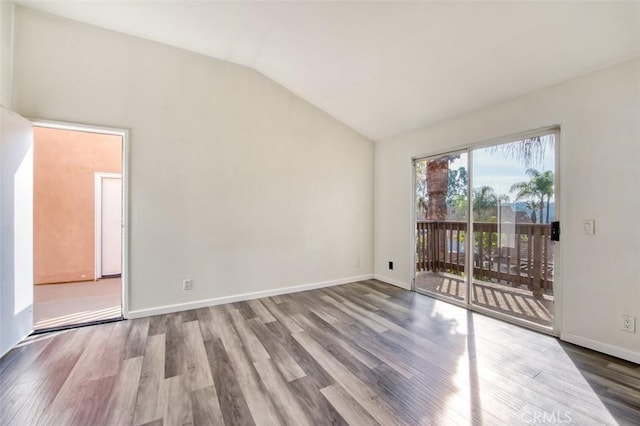 25246 San Michele, Laguna Niguel, CA 92677 - unfurnished room with baseboards, wood finished floors, and vaulted ceiling