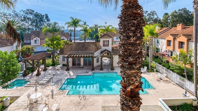 25246 San Michele, Laguna Niguel, CA 92677 - community pool with a patio area, a residential view, a pergola, and fence
