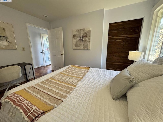 bedroom featuring hardwood / wood-style floors