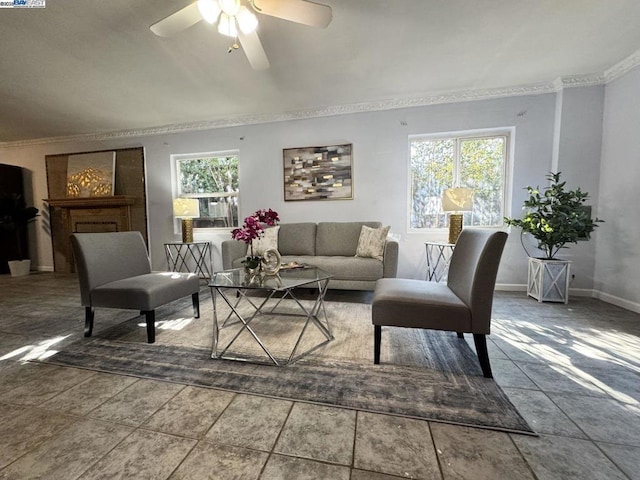 living room with crown molding and ceiling fan