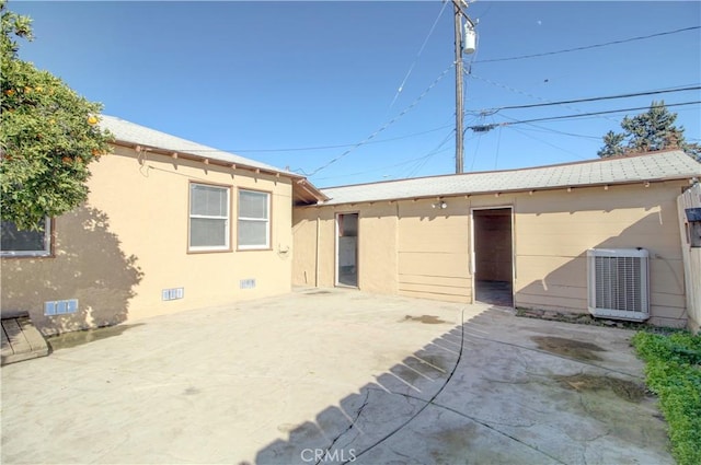 back of house featuring a patio and central AC