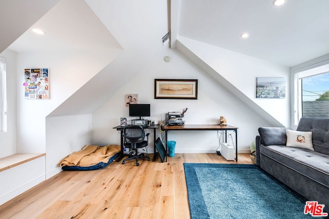 office space with hardwood / wood-style flooring