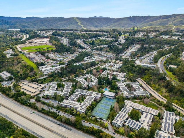 drone / aerial view featuring a mountain view