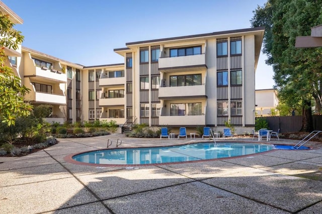 view of pool with a patio