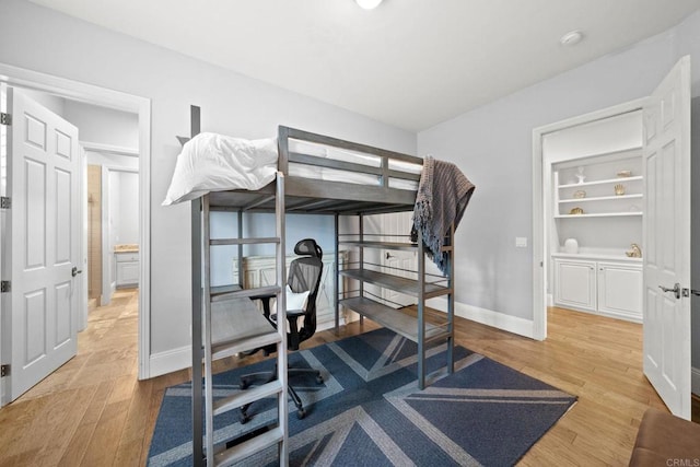 bedroom featuring light hardwood / wood-style floors