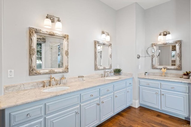 bathroom featuring vanity and hardwood / wood-style floors