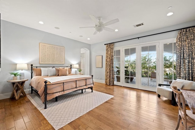 bedroom with access to exterior, ceiling fan, and light wood-type flooring