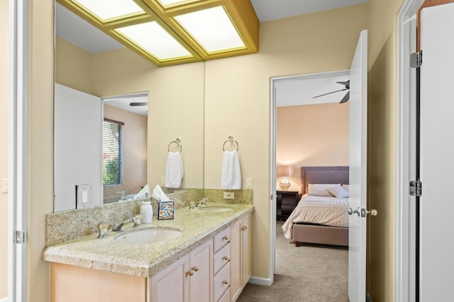 bathroom featuring vanity and ceiling fan