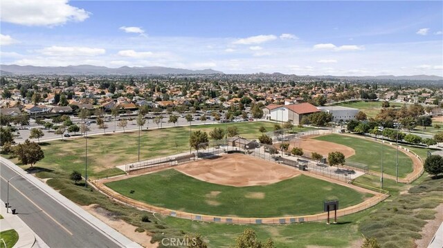 drone / aerial view featuring a residential view and a mountain view