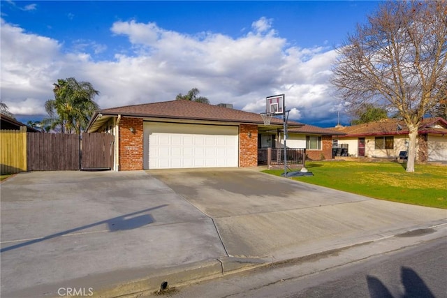 single story home featuring a garage and a front lawn