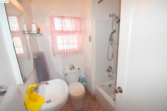 full bathroom featuring sink, shower / tub combination, and toilet