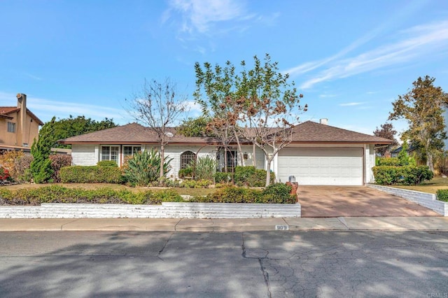 single story home with a garage