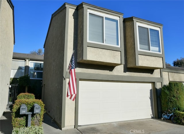 view of property exterior with a garage