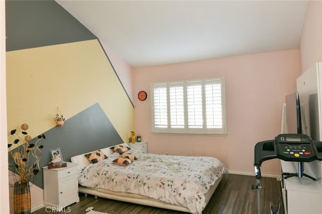 bedroom featuring dark wood-type flooring