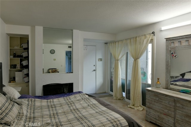 bedroom featuring a textured ceiling