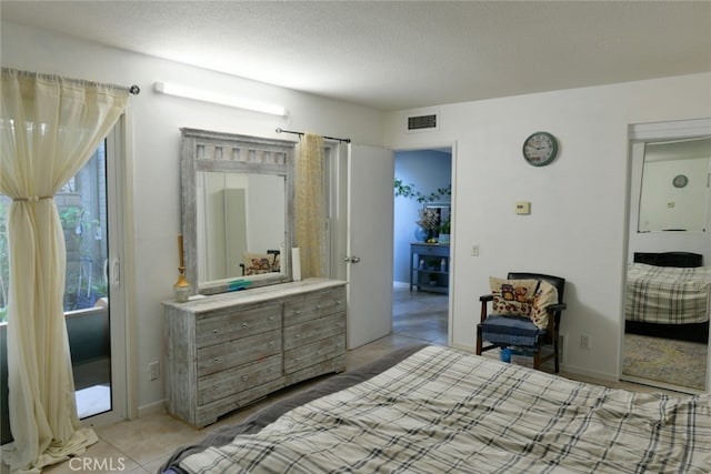 bedroom with a textured ceiling