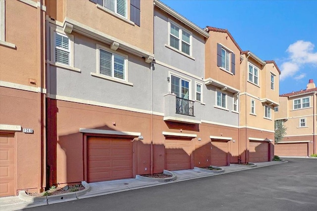 view of building exterior featuring a garage