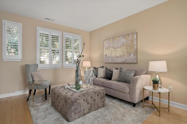 living room featuring light wood-type flooring