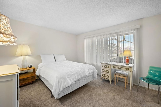 carpeted bedroom with a textured ceiling