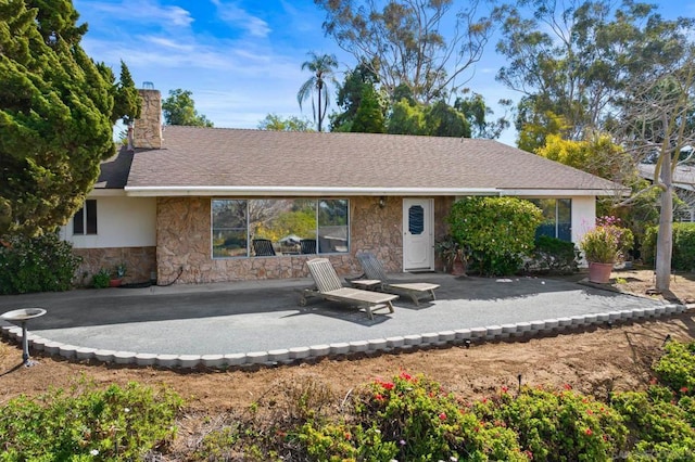 ranch-style home with a patio area