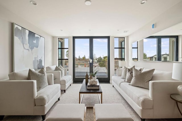 living room featuring a wall of windows