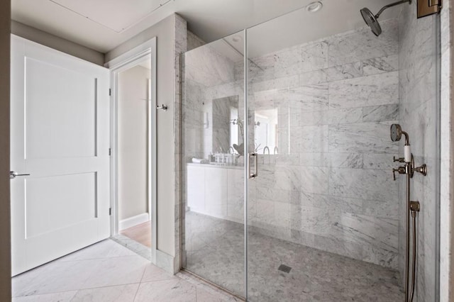 bathroom featuring tile patterned flooring and walk in shower