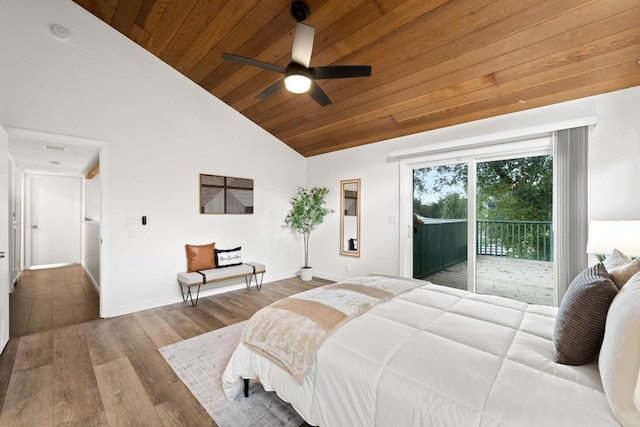 bedroom with lofted ceiling, hardwood / wood-style floors, access to exterior, and wood ceiling