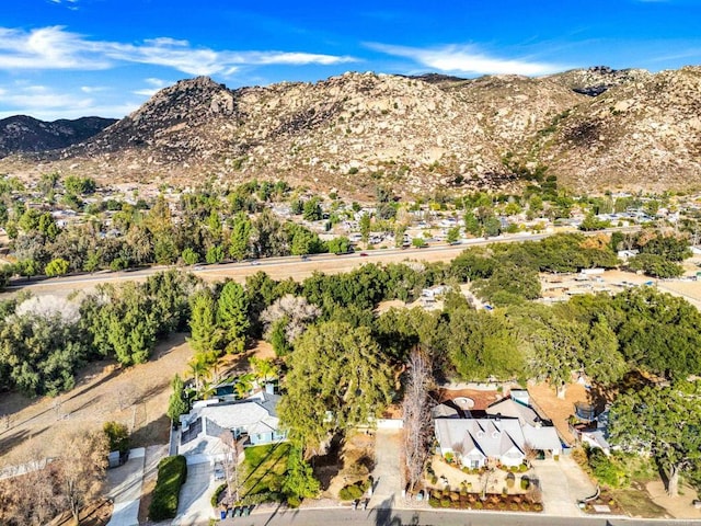 drone / aerial view featuring a mountain view