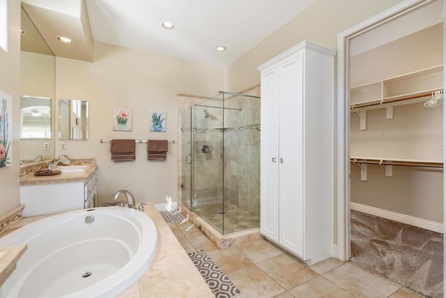 bathroom featuring vanity, separate shower and tub, and tile patterned flooring