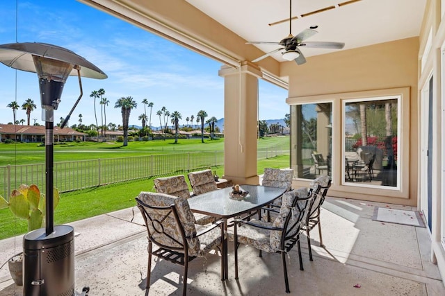 view of patio / terrace featuring ceiling fan