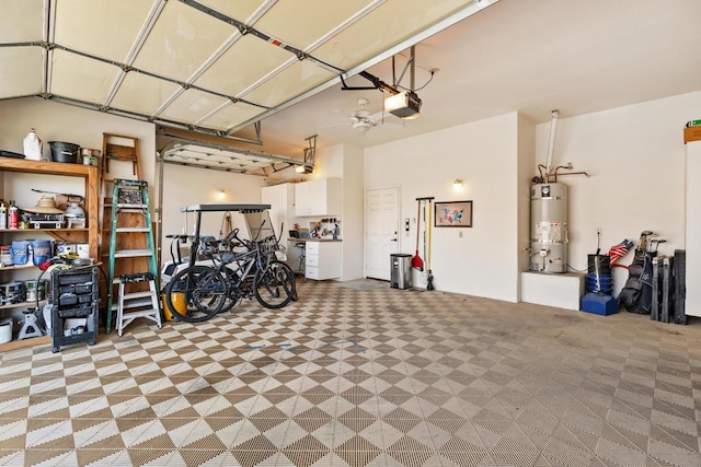 garage with a garage door opener and strapped water heater