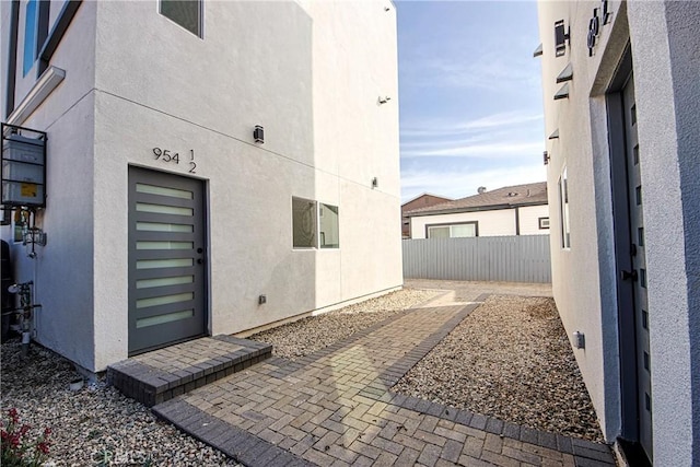 doorway to property featuring a patio