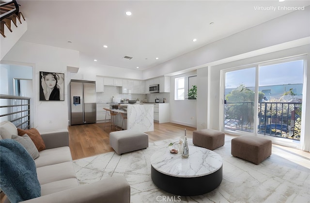 living room with light wood-type flooring