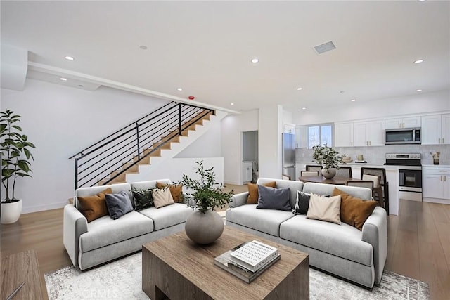 living room featuring light wood-type flooring