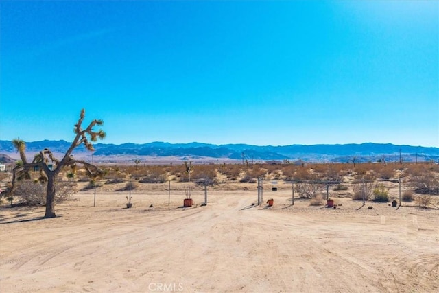 property view of mountains featuring a rural view