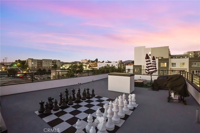 exterior space with a view of city and a balcony