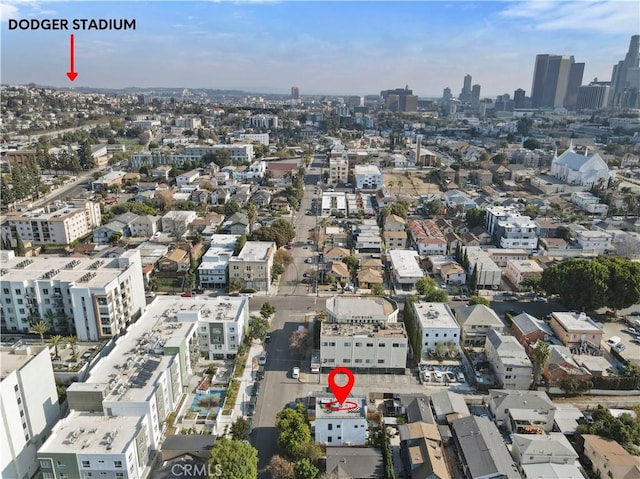 birds eye view of property with a view of city