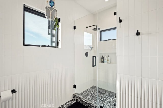 full bath featuring a stall shower