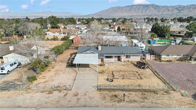 bird's eye view with a residential view and a mountain view