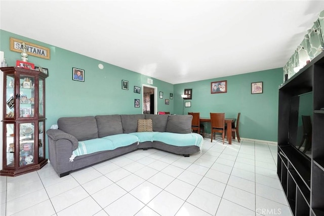 living room with light tile patterned flooring