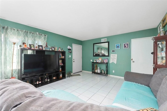 living room with light tile patterned floors