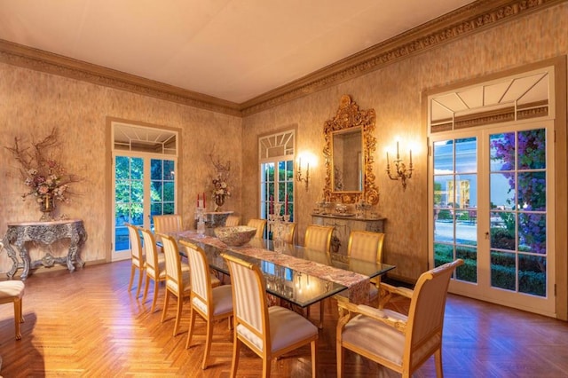 dining room with parquet floors and crown molding